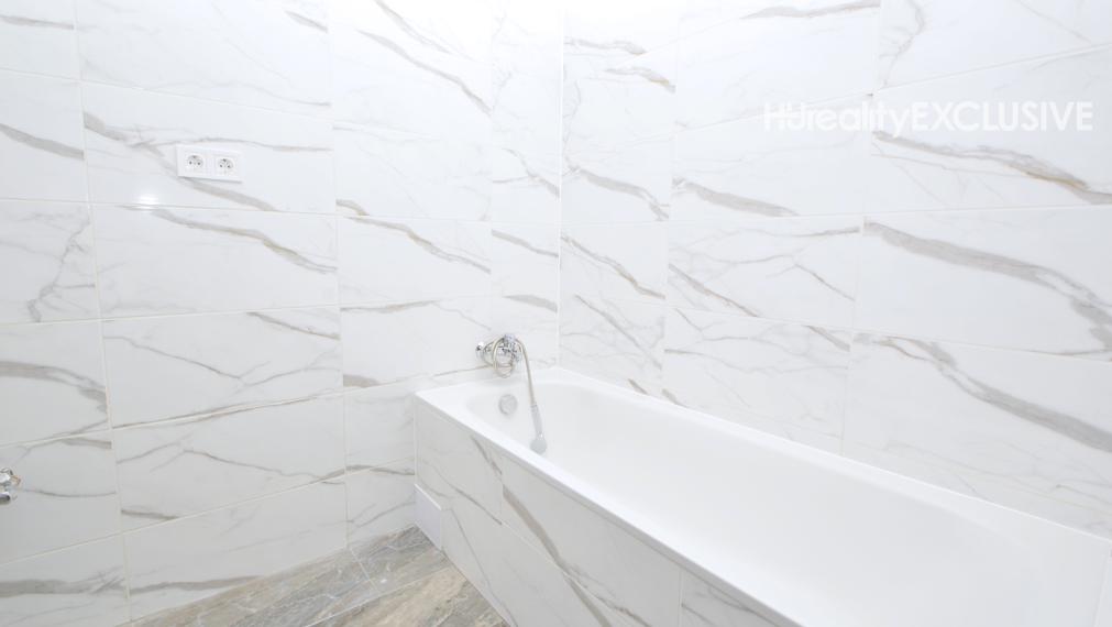 Predaj 3i byt s 260 m2 pozemkom, garážou a pivnicou, Bezenye