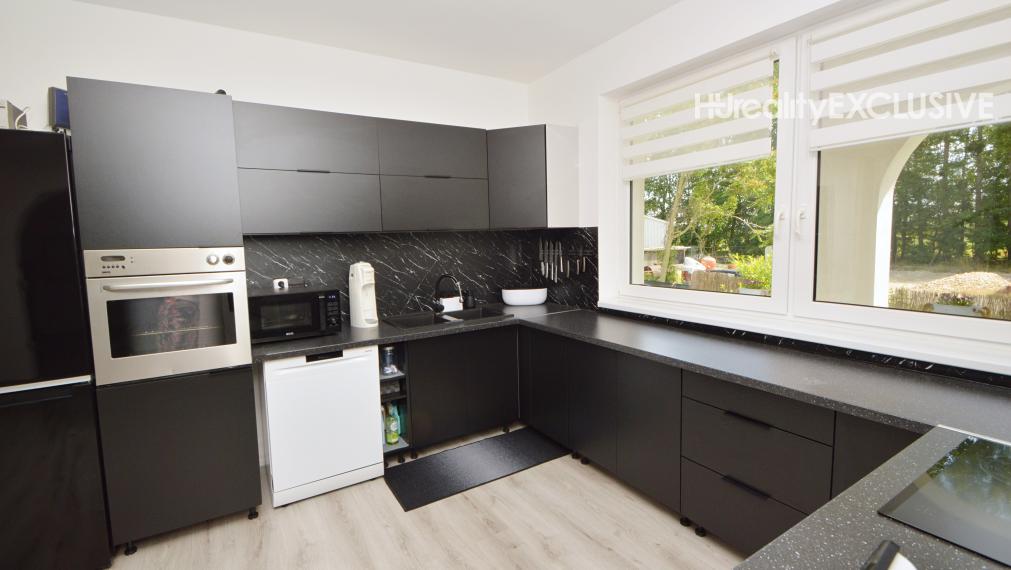 Predaj priestranný 5i rodinný dom s 1483 m2 pozemkom, pivnica, garáž, Dunakiliti